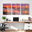 Ensemble de 3 tableaux sur toile représentant un héron au coucher du soleil sur la plage-513033702