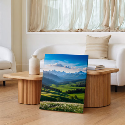 Canvas A Serene Expansive Landscape Featuring Vibrant Green Hills And Lush Wall Art Valleys Under A Bright Blue Sky With Soft Fluffy Canvas Wall Art