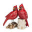 Figurine cardinal sur une souche de bouleau