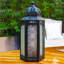 Bougie décorative lanterne marocaine rétro lanterne marocaine en métal noir pour décoration de patio extérieur. Verre transparent, moyen