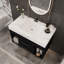 Meuble-lavabo moderne et peu encombrant avec lavabo en céramique, design noir et blanc pour petits espaces