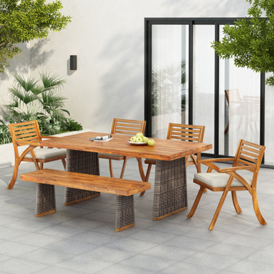 Outdoor 6 Pieces Acacia Wood Dining Set with Cushion and Handwoven Rattan Legs, Durable and Stylish for Patio Use