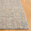 Tapis géométrique beige / bleu en jute de laine touffeté à la main Alvonia-2073939264