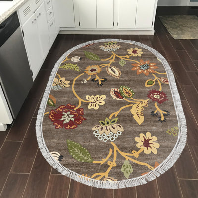 Tapis ovale floral en polyamide tissé à la machine couleur café