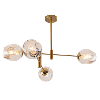 Lustre 4 lumières Mid-Century doré avec globe en verre