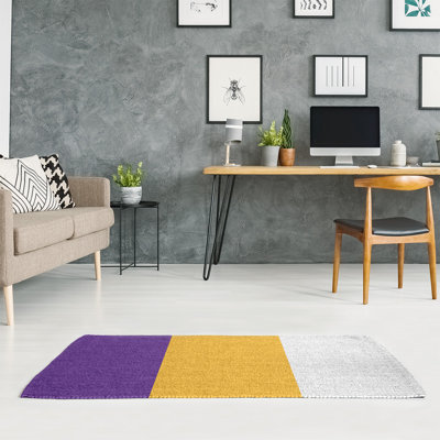 Tapis mauve/doré rayé