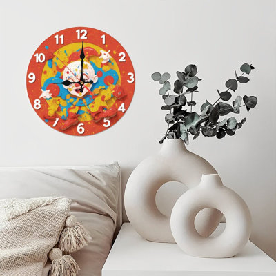 Horloge de clown avec éclaboussures de peinture