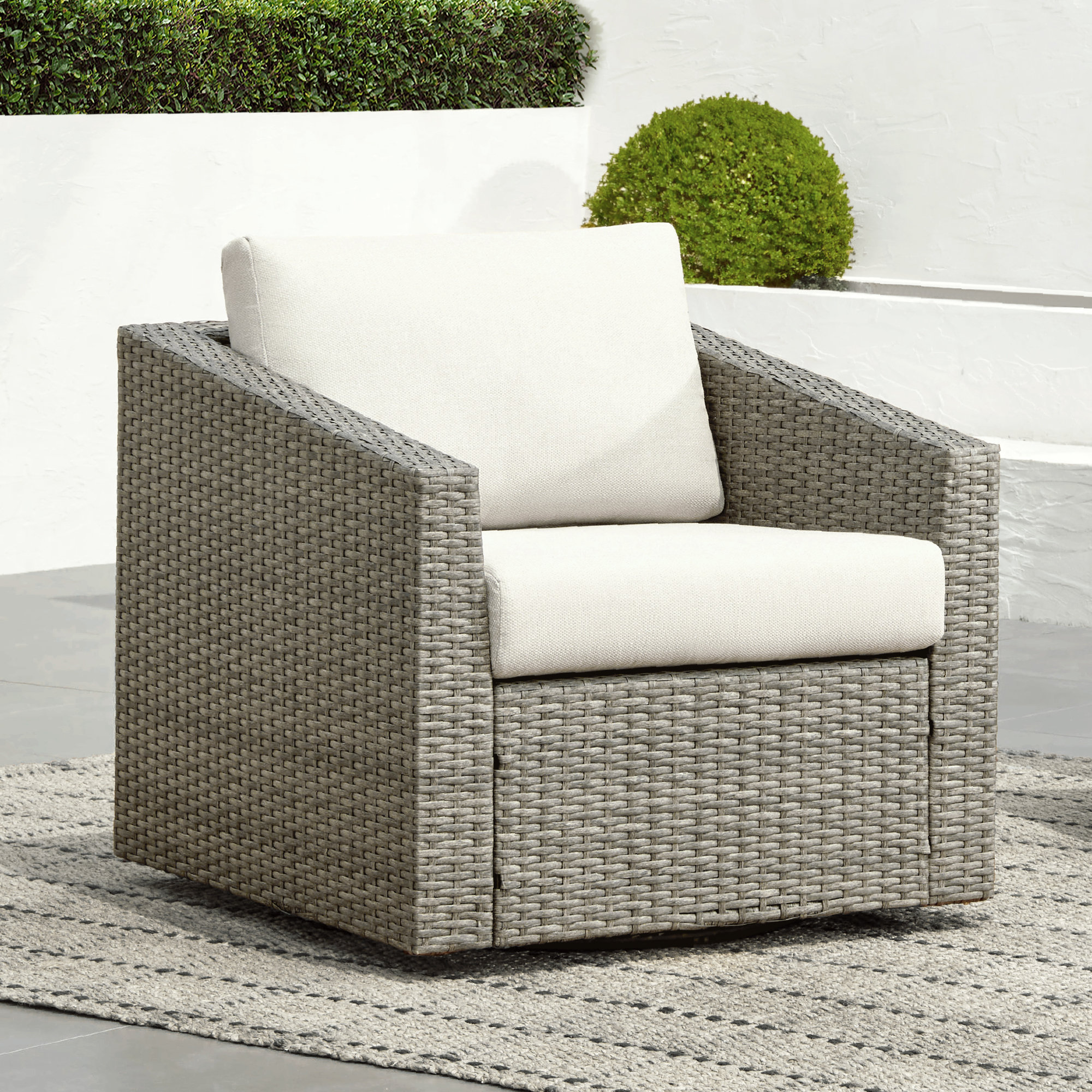 Tiaka Outdoor Swivel Rattan Single Patio Chair with Ottoman