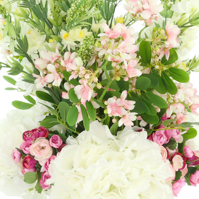 Centre de table avec bruyère sauvage, hortensias et delphinium