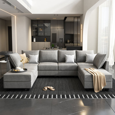 Canapé modulaire en U avec repose-pieds Coss