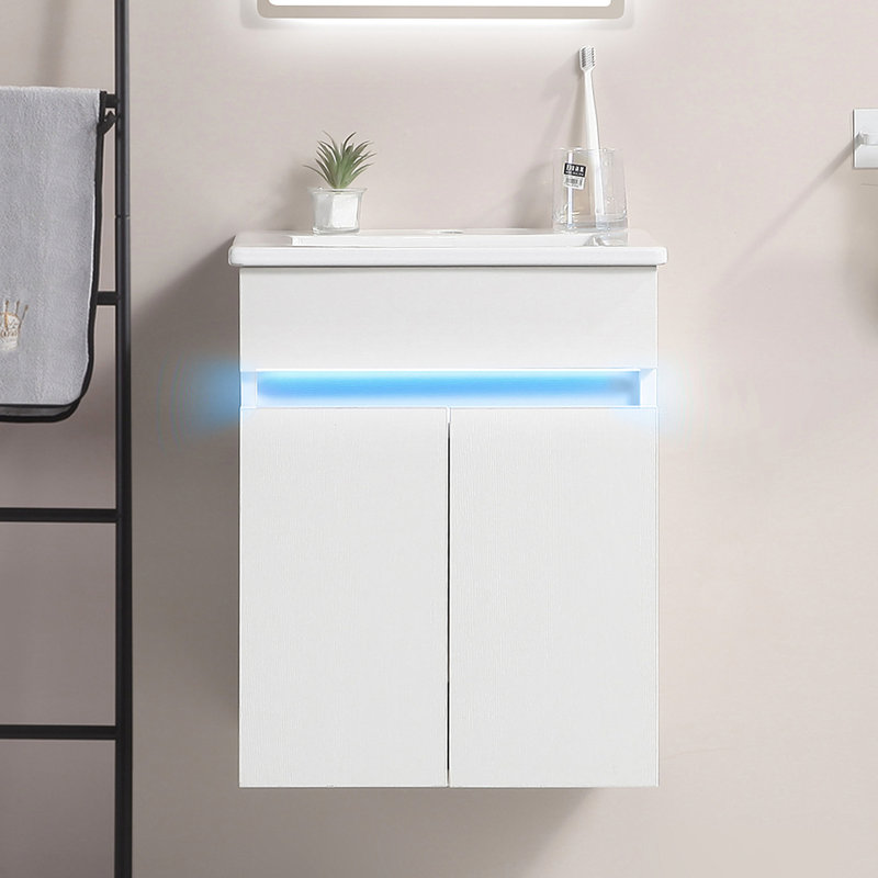 Meuble-lavabo de 16 po avec lavabo en céramique, fixation murale. Blanc, espace de rangement abondant. Détection de radars.. Armoire moderne. Lavabo requis 16 po, montage blanc pour les petits espaces de salle de bain. Caractéristiques et