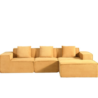 Canapé modulaire en velours côtelé avec coussins en jaune gingembre, configuration simple, confort pour des invités polyvalents et rapides en forme de L