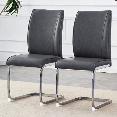 Luxury Simple Arch Chair - Set Of 2 PU Material High Resilience Dining Chair With Arched Metal Silver Leg.
