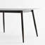 Grande table rectangulaire avec base en métal solide et table de salle à manger moderne en pierre