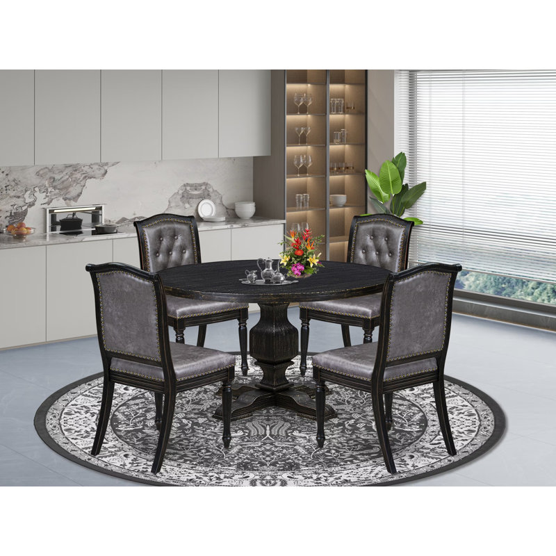 Cet ensemble de table de salle à manger moderne 5 pièces comprend une table ronde et 4 chaises en polyester gris foncé à haut dossier avec une finition noire sablée.