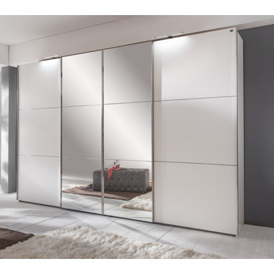 Caouette 4 Door Manufactured Wood Wardrobe