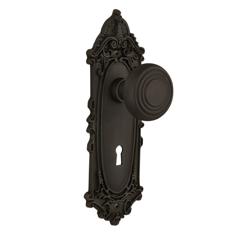 Plaque victorienne avec trou de serrure décoratif et poignée de porte décorative, Bronze frotté à l'huile