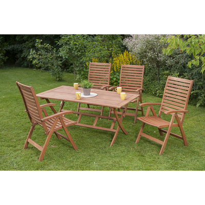 Adabpreet 4 - Person Eucalyptus Solid Wood Patio Dining Set Rectangular Table