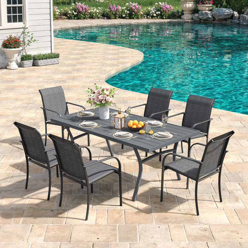 Ensemble repas pour 6 personnes avec table de salle à manger rectangulaire 63 po et 6 chaises empilables PVC-coated polyester
