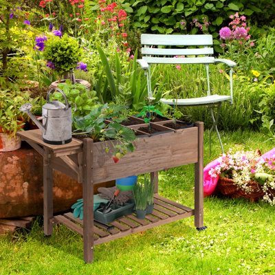 Boîte à plantes surélevée en bois 49 po x 21 po x 34 po avec rangement, 8 grilles et roues, pour légumes, herbes, fleurs, lit de jardin brun, grilles de croissance, table d'appoint pliante et