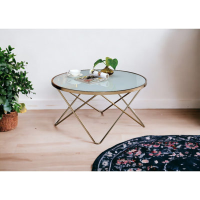 Table basse élégante en forme de V à croisement avec plateau en verre