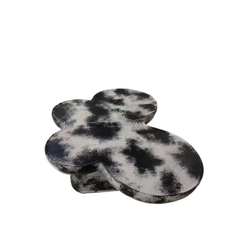 Table basse en forme de papillon avec texture faux travertin, Noir / Beige