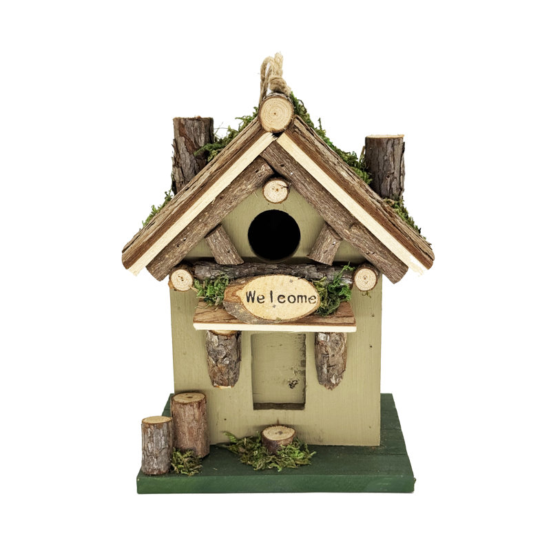 Cabane à oiseaux avec tronc d'arbre