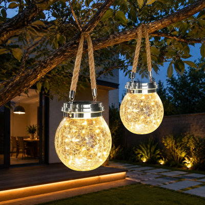 A 2 Pack of L Size waterproof outdoor hanging garden lights contains 30 LED lighting and is positioned as a gift for women for Halloween, Christmas, or Easter.