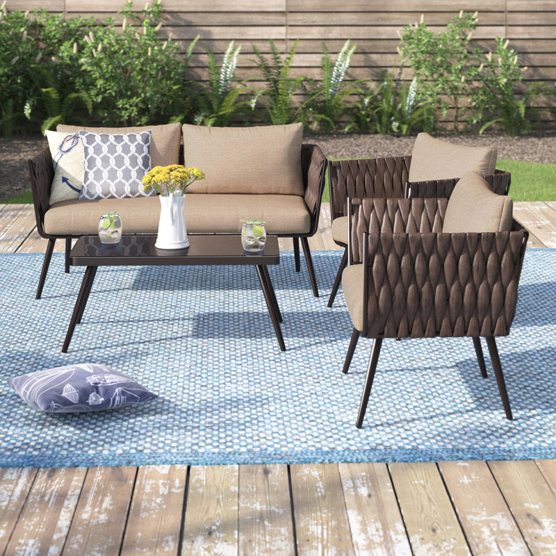 Reign Premium All-Weather Wicker 4 - Person Patio Conversation Set with Cushions
