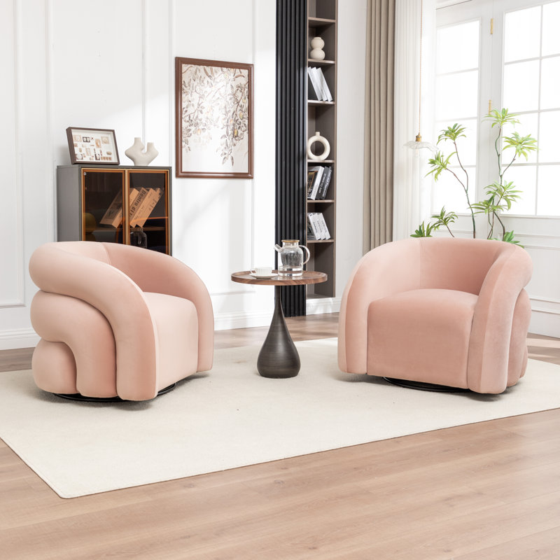 Fauteuil demi-tonneau pivotant rembourré Coyle, Rose