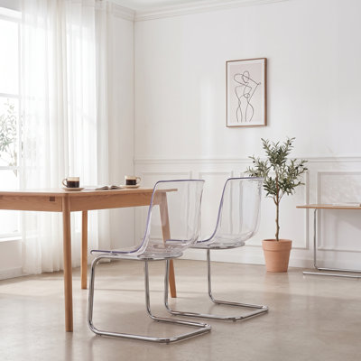 Ensemble de 4 chaises de salle à manger modernes en acrylique transparent avec base en porte-à-faux en métal chromé argenté