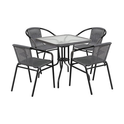 Ensemble de patio carré intérieur / extérieur - Table en verre et métal avec 4 chaises en rotin gris