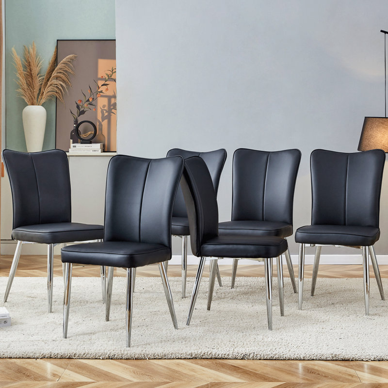 Chaises de salle à manger minimalistes, dossier incurvé en cuir de polyuréthane noir et coussins de siège