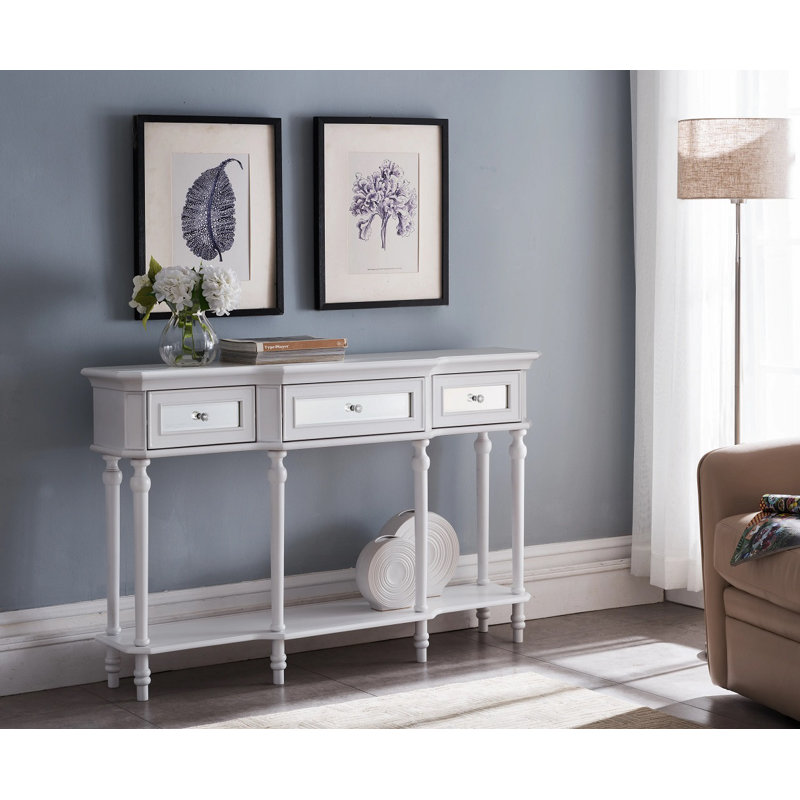 Gisele - Solid Wood Console Table With Three Storage Drawers And Lower Shelf For Entryway Hallway Or Living Room Featuring Turned Legs Mirrored Drawer Panels And Classic White Finish Accent Details