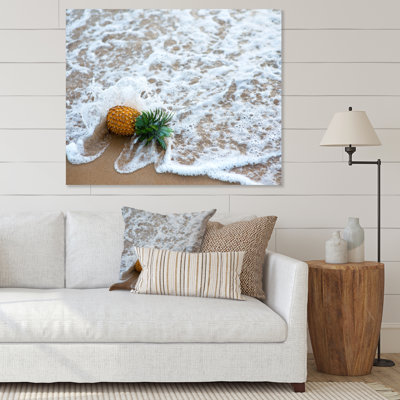 Pineapple Fallen By Ocean Wave - photographie sur toile