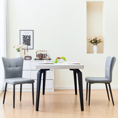 De 2 luxueuses chaises de salle à manger à haut dossier avec structure en fer forgé, sièges en cuir et coussins de soutien - pour des espaces élégants, associez une conception ergonomique à haut dossier, un support et un siège idéal pour les deux personnes.