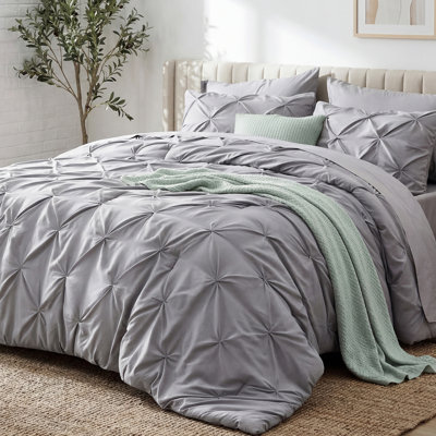 Édredon à plis pincés avec draps, taies d'oreiller et taies décoratives