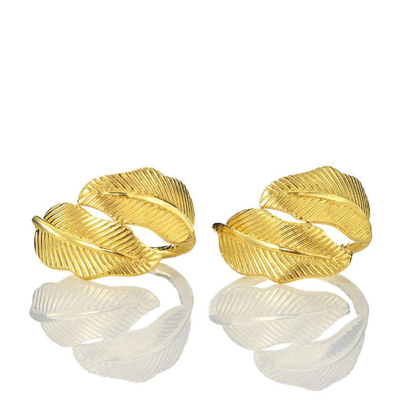 Gold Napkin Rings Set of 4 Stylized Overlapping Leaf Design for Elegant Dining Table Decor