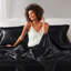 Ensemble de draps en satin de luxe noir 7 pièces, doux au toucher, frisottis, 1 drap plat, 2 draps-housses, 4 taies d'oreiller et soyeux