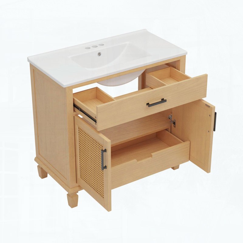 Meuble-lavabo en rotin avec lavabo en céramique et portes artisanales