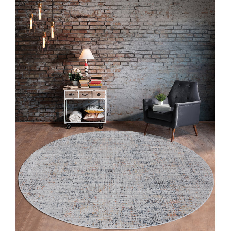 Tapis abstrait ivoire / bleu, Rond 7 pi 10 po
