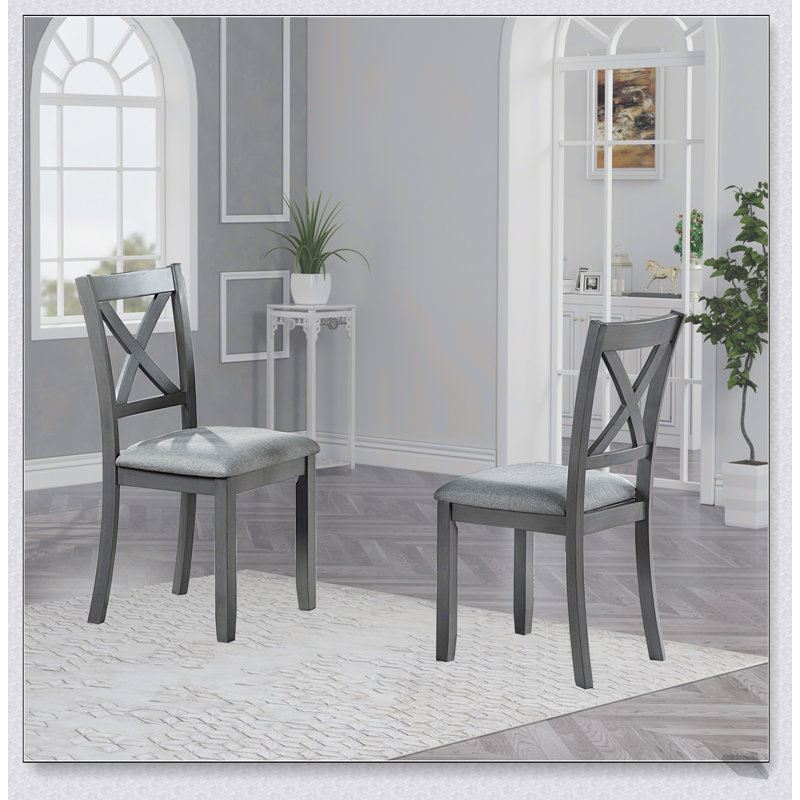 Ensemble de chaises de salle à manger élégantes pour 4 avec sièges rembourrés, dossiers confortables et fabrication robuste pour un décor moderne et traditionnel.