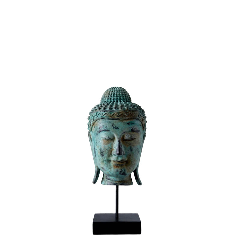 Statue de tête de bouddha antique sur pied