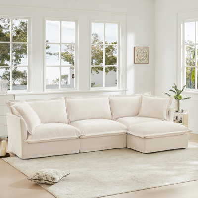 Canapé modulaire surdimensionné confortable avec repose-pieds convertible et coussins moelleux, parfait pour se détendre et recevoir dans votre salon
