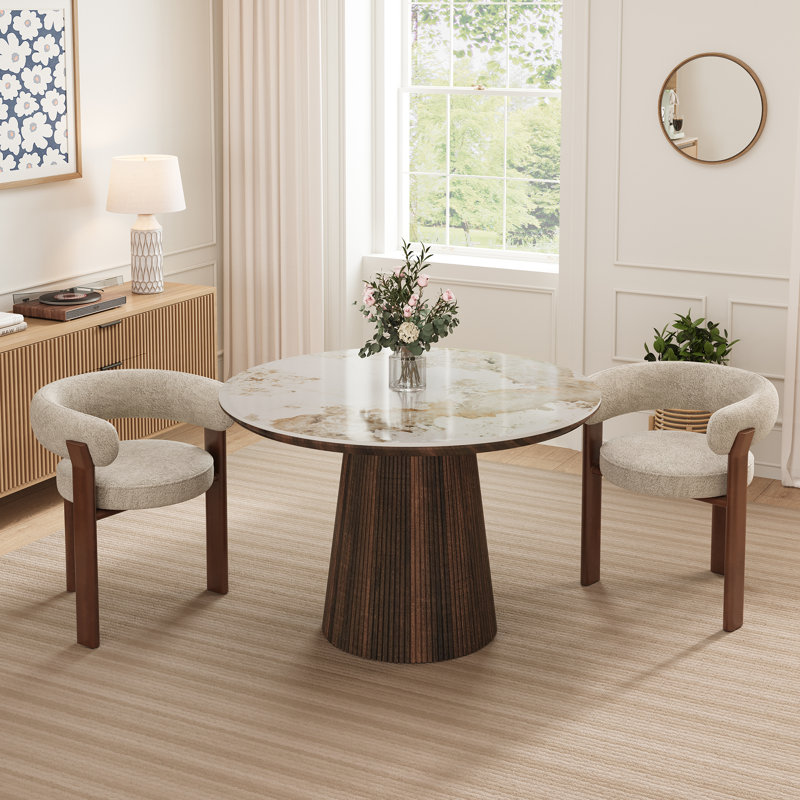 Ensemble de table et de chaises Adwin pour 2 personnes, comprenant une table ronde de 120 cm et 2 fauteuils rembourrés Teddy.