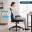 Chaise de bureau ergonomique en maille noire avec soutien lombaire, accoudoirs relevables et tissu respirant pour un confort et une durabilité optimaux.