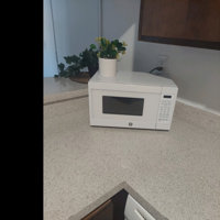 GE® 0.7 Cu. Ft. Capacity Countertop Microwave Oven - JES1072DMBB