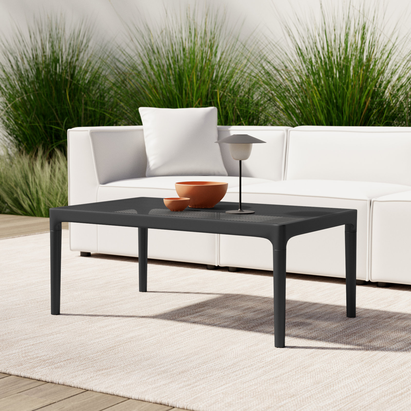 Farrah 23.6'' Plastic / Acrylic Outdoor Coffee Table, Black, 23.6"W x 15.7"H x 39.4"L