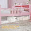 Lit plateforme rose simple avec garde-corps, tête de lit et tiroirs de rangement, cadre de chambre d'enfant-646551085