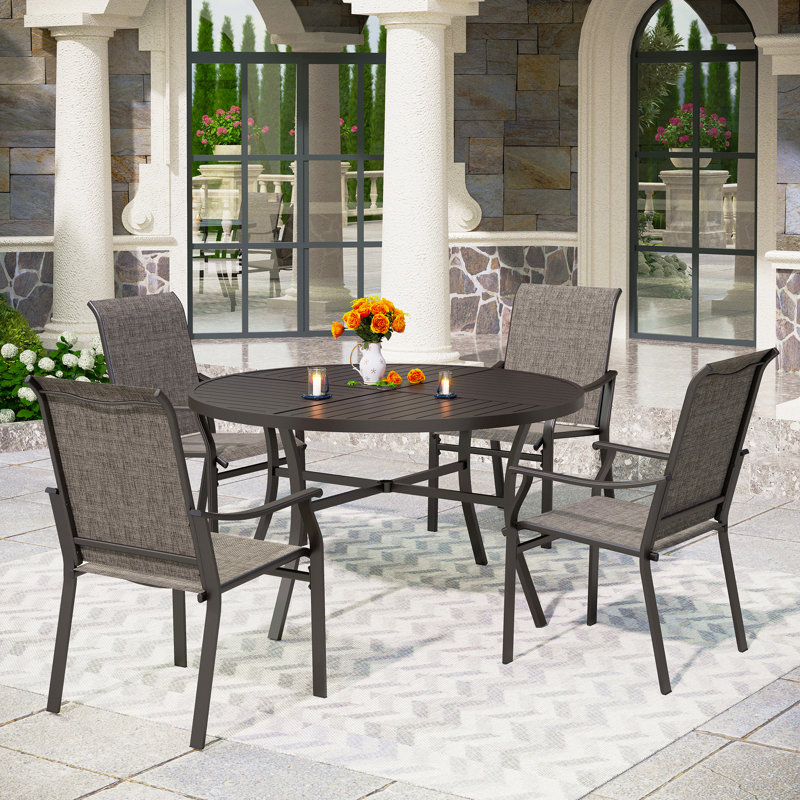 Basima 4 - Person Patio Dining Set with Round Table